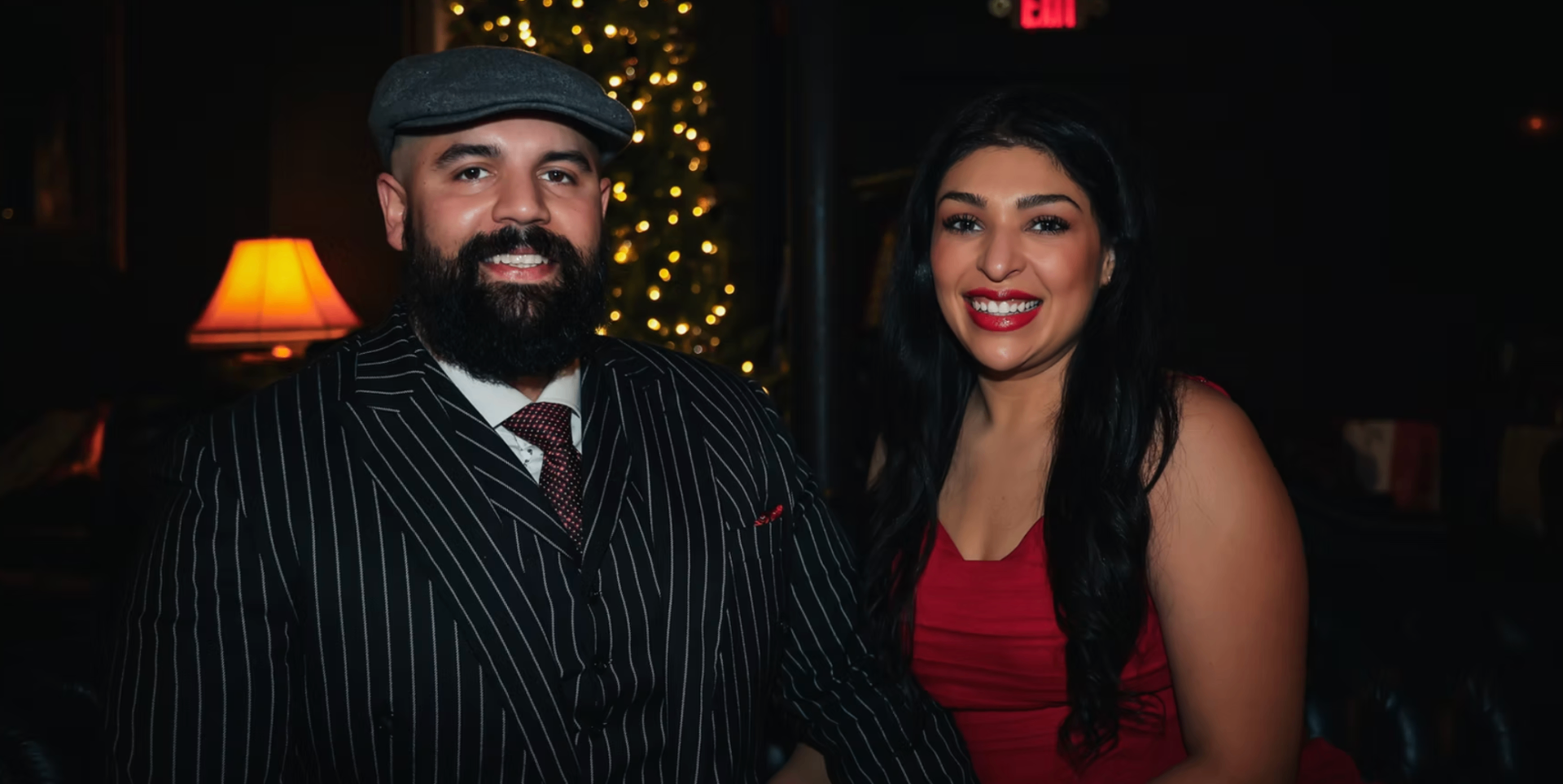 The owners of KC Pours behind the bar